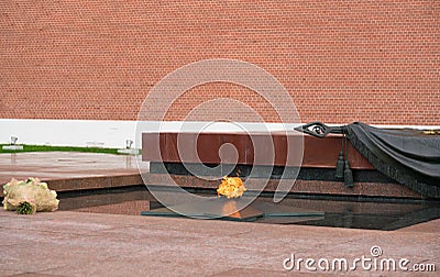 Moscow, Russia - July 20, 2019: The Eternal Flame is burning, Victory Monument at the Kremlin wall, in Alexander Garden Editorial Stock Photo