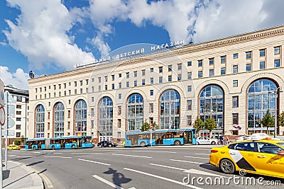 Moscow, Russia - July 28, 2019: Facade of Central Children Store in Moscow on the background of public transport at sunny summer Editorial Stock Photo