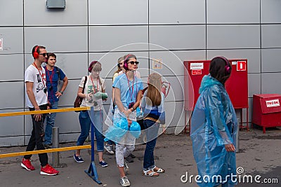 MOSCOW, RUSSIA - JULY 22, 2018: A group of young people in multi-colored headphones SONY h.ear on gathered for party Editorial Stock Photo