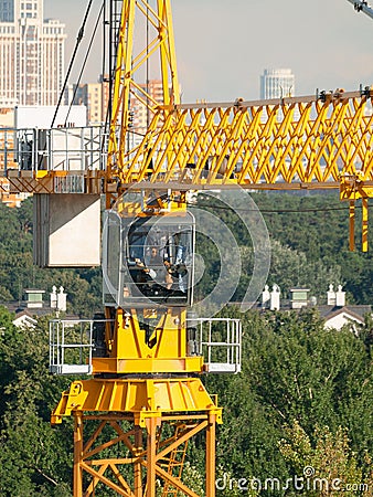 Liebherr construction crane, workman operator have a rest in cabin Editorial Stock Photo