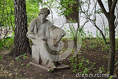 Moscow Russia July 11, 2018. - A stone monument to the chronicler`s monk Editorial Stock Photo