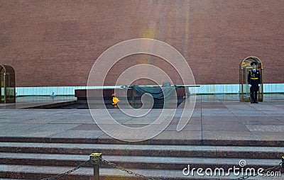 MOSCOW, RUSSIA - July 3, 2018. Tomb of the Unknown Soldier at the Kremlin in Moscow, Russia. The Eternal Flame burns in memory of Editorial Stock Photo