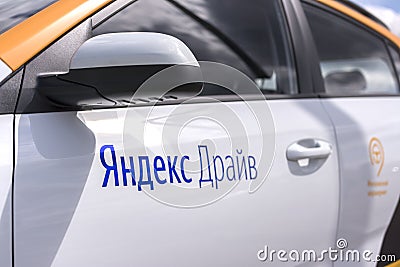 Moscow, Russia, 30 July 2019. Yandex Drive - Russian car sharing car in Moscow. Close-up focus on the first letter Editorial Stock Photo