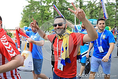 MOSCOW, RUSSIA - June 26, 2018: fans take photo with russian beauty models before the World Cup Group C game between France and De Editorial Stock Photo