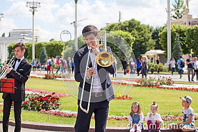 New Life Brass band, wind musical instrument player, orchestra performs music, musician plays trombone portrait, trumpeter man Editorial Stock Photo