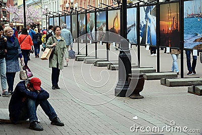 Photo exhibition on the pedestrian street Arbat. Editorial Stock Photo