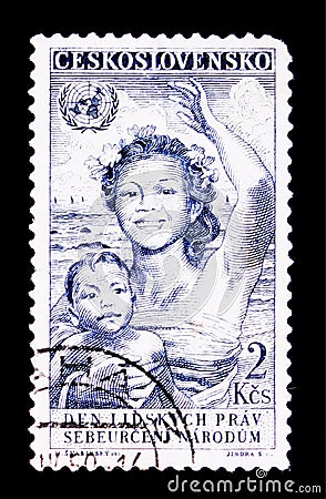 MOSCOW, RUSSIA - JUNE 20, 2017: A stamp printed in Czechoslovakia shows woman with child, Day of human rights, circa 1950 Editorial Stock Photo