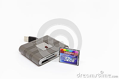Moscow / Russia - March 6, 2019: Kingston universal card reader and a 32 gigabyte transcend compact flash memory card. Editorial Stock Photo