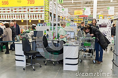 MOSCOW, RUSSIA -MARCH 14: People pay for goods at checkout in Leroy Merlin Editorial Stock Photo