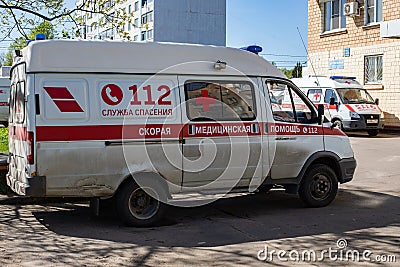 Moscow, Russia - May 11, 2020: Dirty Ambulance car returning from a call. Russian medical aid car Editorial Stock Photo