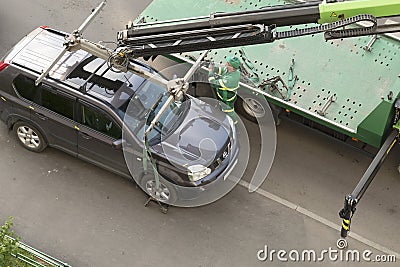 Evacuation of the car for the wrong parking on the sidewalk. Moscow / Russia - May 2019 Editorial Stock Photo