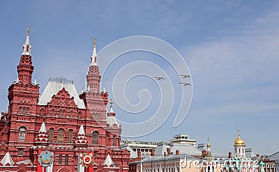 The flight in the sky of three IL-76MD heavy long-range military aircrafts in a blue sky. The main Editorial Stock Photo