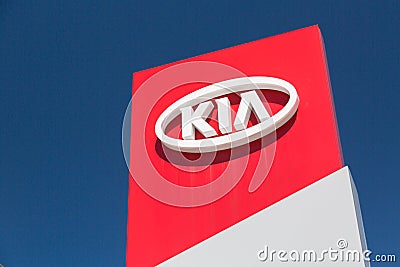 Moscow, Russia - May, 2018: Kia automobile dealership Sign against blue sky. Kia is a South Korean manufacturer of automobiles and Editorial Stock Photo