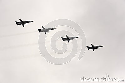 Modernized front-line bombers with a variable sweep wing Su-24M in the sky over Moscow`s Red Square during the Victory Air Parade Editorial Stock Photo