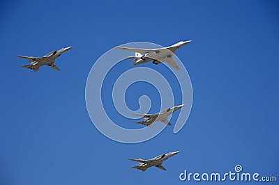Rehearsal of the Victory Day celebration WWII. The airshow on the Red Square. Group of supersonic bombers-missile Tu-22M3 Backf Editorial Stock Photo