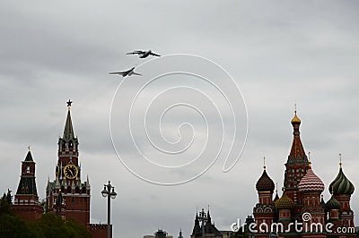 Simulation of air refueling of IL-78 and Tu-160 aircraft during the air parade in Moscow dedicated to the 75th anniversary of Vict Editorial Stock Photo