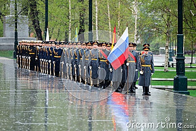 MOSCOW, RUSSIA - MAY 08, 2017: Soldiers of The Honor Guard of the 154 Preobrazhensky Regiment. Rainy and snowy view. Alexander Ga Editorial Stock Photo