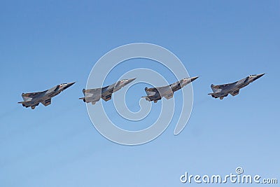 Moscow, Russia - May 07, 2019: Supersonic high-altitude all-weather long-range interceptor fighter MiG-31 in the blue sky over Red Editorial Stock Photo