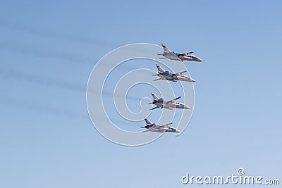 Moscow, Russia - May 07, 2019: Tactical front bomber with a variable sweep wing Su-24M in the blue sky over Red Square. Aviation Editorial Stock Photo