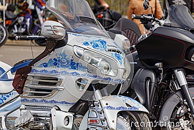 Moscow, Russia - May 04, 2019: Tourist motorcycle Honda Gold Wing with airbrushing of russian painting Gzhel in the parking Editorial Stock Photo