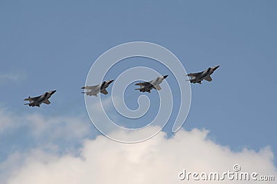 Upgraded MiG-31K interceptor fighters with a hypersonic Dagger missile on the hull in the sky over Moscow`s Red Square during the Stock Photo