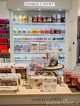 Moscow, Russia, November 2020: Corner of the Yankee candle brand in the megamall. Showcase with a variety of scented candles in Editorial Stock Photo