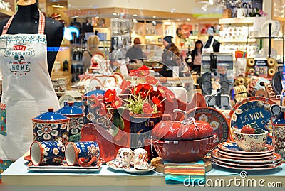 Moscow, Russia, November 2019: tableware shop Window: a set of bright plates, cups in the Mexican style, the inscription La vida, Editorial Stock Photo