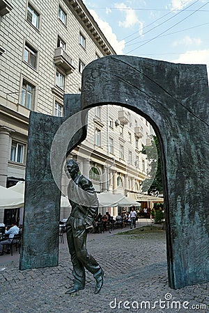 Monument to the poet and bard Bulat Okudzhava on Arbat. Editorial Stock Photo