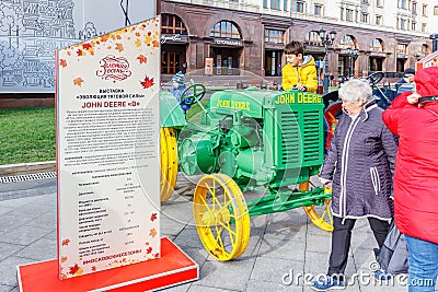 Moscow, Russia - October 08, 2019: Restored american wheel tractor JOHN DEERE D Popping Johnnie on the exhibition of agricultural Editorial Stock Photo