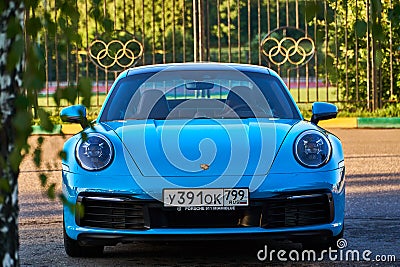 Moscow, Russia 07-02-02019 Porsche 911 Carrera 4S & x28;Miami Blue& x29; 992 Sports front car front view in the parking lot. Editorial Stock Photo