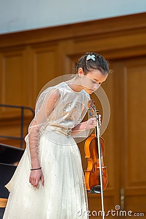 Girl violonist on the stage. Editorial Stock Photo