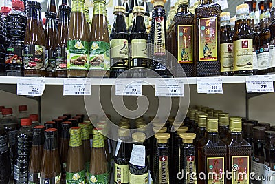 Moscow, Russia, 07/03/2020: A selection of Asian sauces on the shelves of a supermarket. Close-up. Front view Editorial Stock Photo