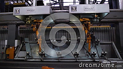 Moscow, Russia - September, 2018: Welding robots movement in car factory. Scene. Movement of robot when welding with Editorial Stock Photo