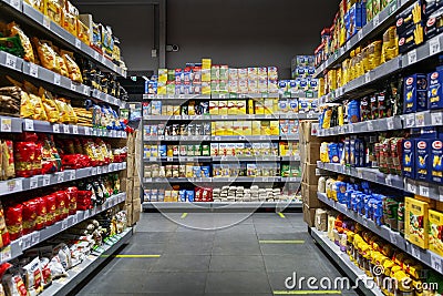 Moscow, Russia, 05/15/2020: Shelves with a large selection of products in a supermarket. Marking for the social distance of buyers Editorial Stock Photo