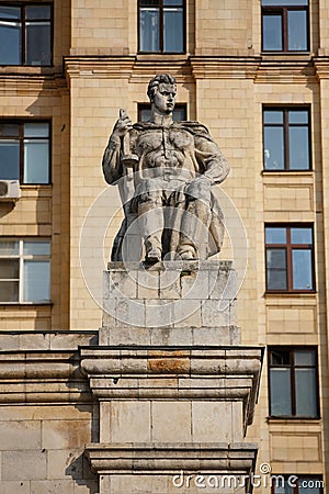 MOSCOW / RUSSIA - 20/04/2019 soviet communist stone sculpture of a strong soldier sitting with a gun sculptors - Baburin, Editorial Stock Photo