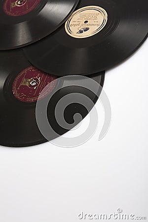 MOSCOW / RUSSIA - 04/05/2020 vertical copy space shot of a stack of three old Soviet phonograph vinyls on a white background Editorial Stock Photo