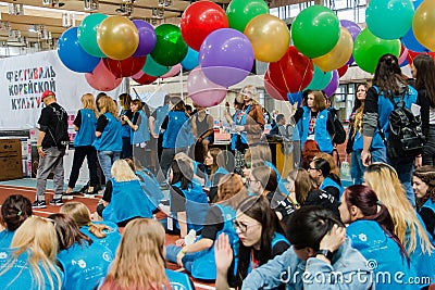 Moscow, Russian, 12 june: group of students volunteers with colorful balloons at the Korean festival Editorial Stock Photo