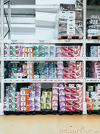 Shelves with toilet paper in Auchan hypermarket Editorial Stock Photo