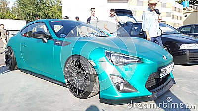 Moscow. Summer 2018. Aquamarine Matte Toyota GT86 Tuned with air suspension, exclusive wide wheels. Wrapped in special film. Editorial Stock Photo