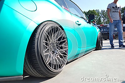 Moscow. Summer 2018. Aquamarine Matte Toyota GT86 Tuned with air suspension, exclusive wide wheels. Wrapped in special film. Editorial Stock Photo