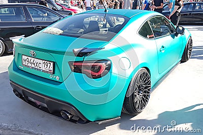 Moscow. Summer 2018. Aquamarine Matte Toyota GT86 Tuned with air suspension, exclusive wide wheels. Wrapped in special film. Editorial Stock Photo