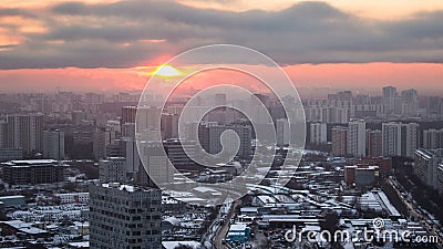 Moscow. Sunset with clouds over buildings timelapse, Russia Stock Photo