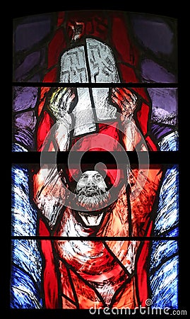 Moses, Crossing the Red Sea, detail of stained glass window in Saint James church in Sontbergen, Germany Editorial Stock Photo