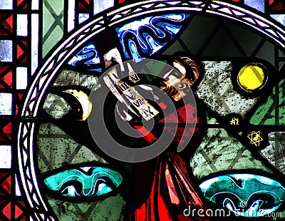 Moses and the Ten Commandments in stained glass Stock Photo