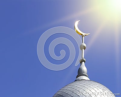 Mosque of Muslim. Crescent on copper covered dome and minaret of mosque against blue sky. Symbol of Islam and Ramadan Stock Photo