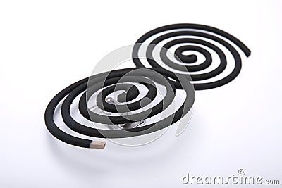 Mosquito repellent incense coil black on white background. Aroma, mesh. Stock Photo