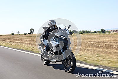 Biker drives Ducati Multistrada V4S Editorial Stock Photo