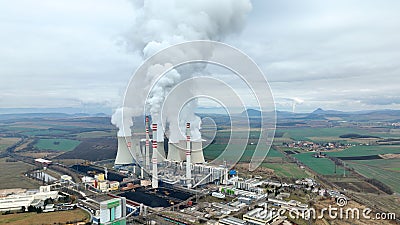 MOST, CZECH REPUBLIC, NOVEMBER 15, 2020: Coal brown power plant factory fired station Pocerady, chimney smokes stacks Editorial Stock Photo