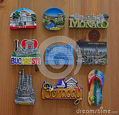 Fridge magnet souvenir in different shape and size from various different country countries and city cities around the world Editorial Stock Photo