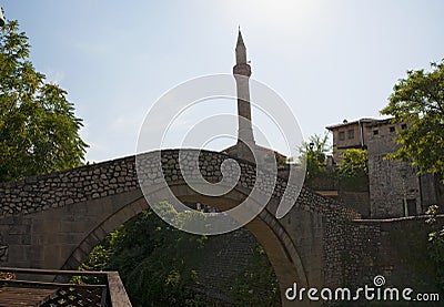 Mostar, skyline, bridge, Kriva Cuprija, Sloping Bridge, Neretva, river, mosque, minaret, Bosnia and Herzegovina, Europe Editorial Stock Photo